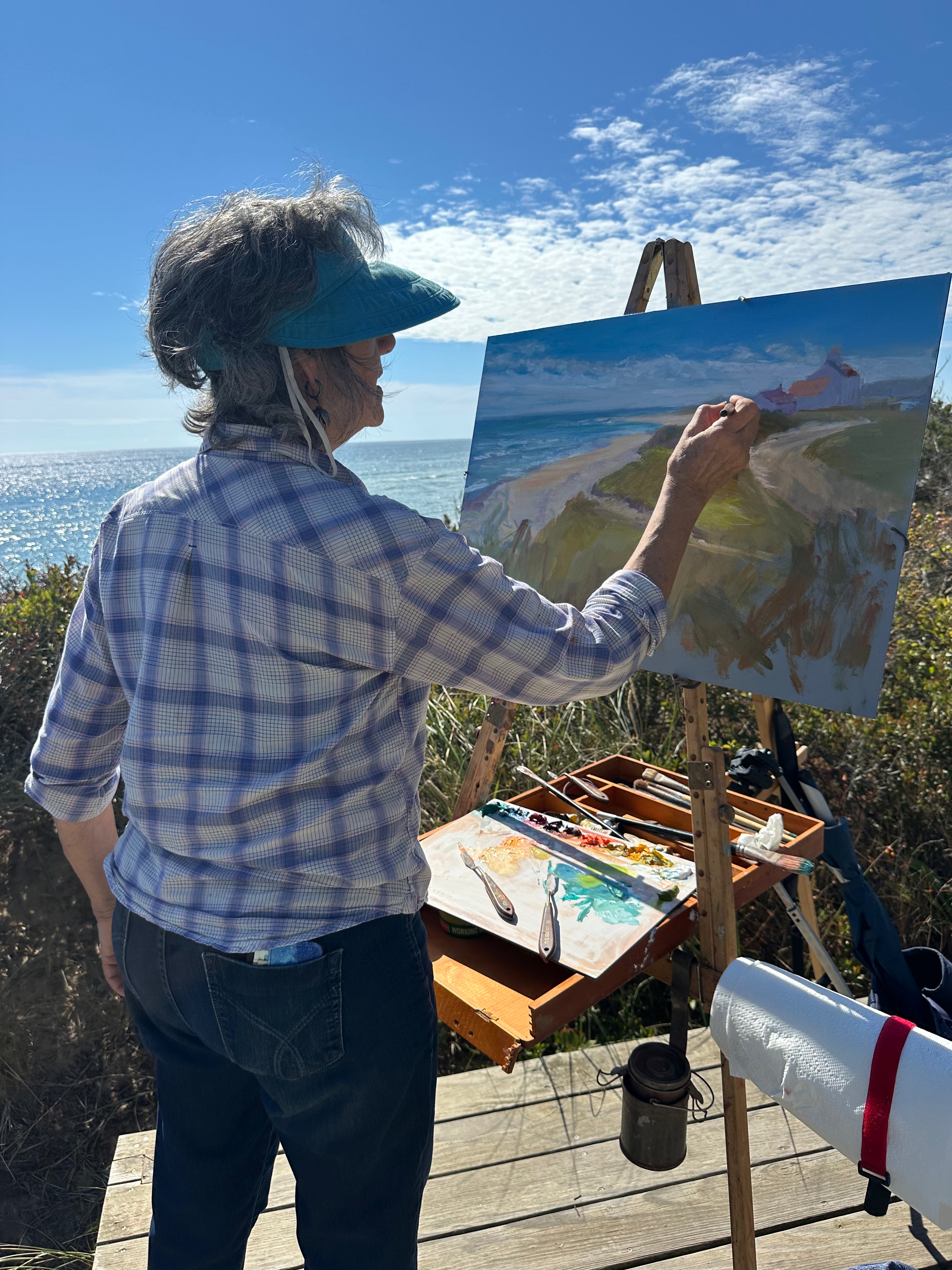 Rosalie nadeau painting at her Nadeau Easel