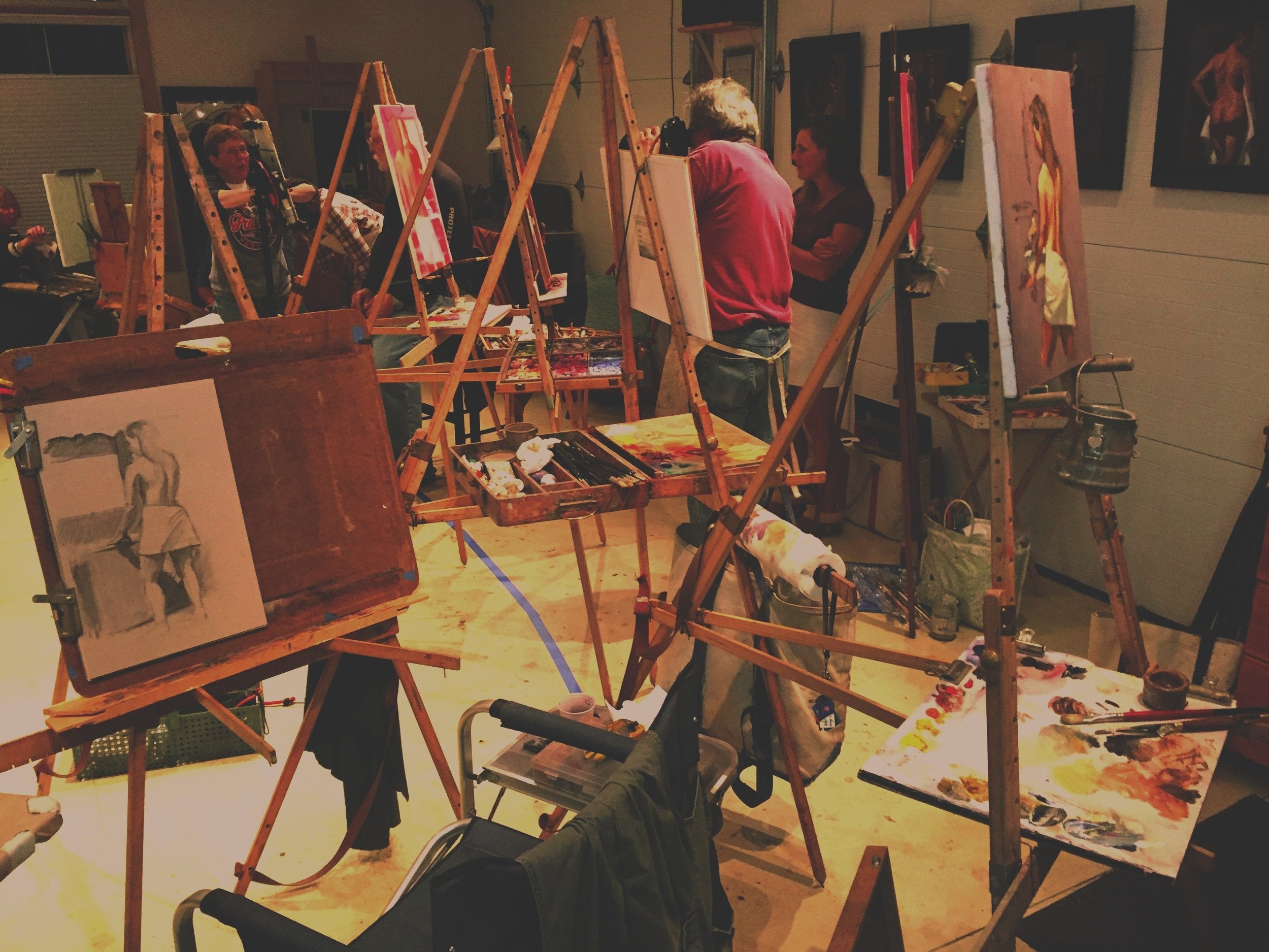 Multiple Nadeau Easels set up in a studio for a group painting session.