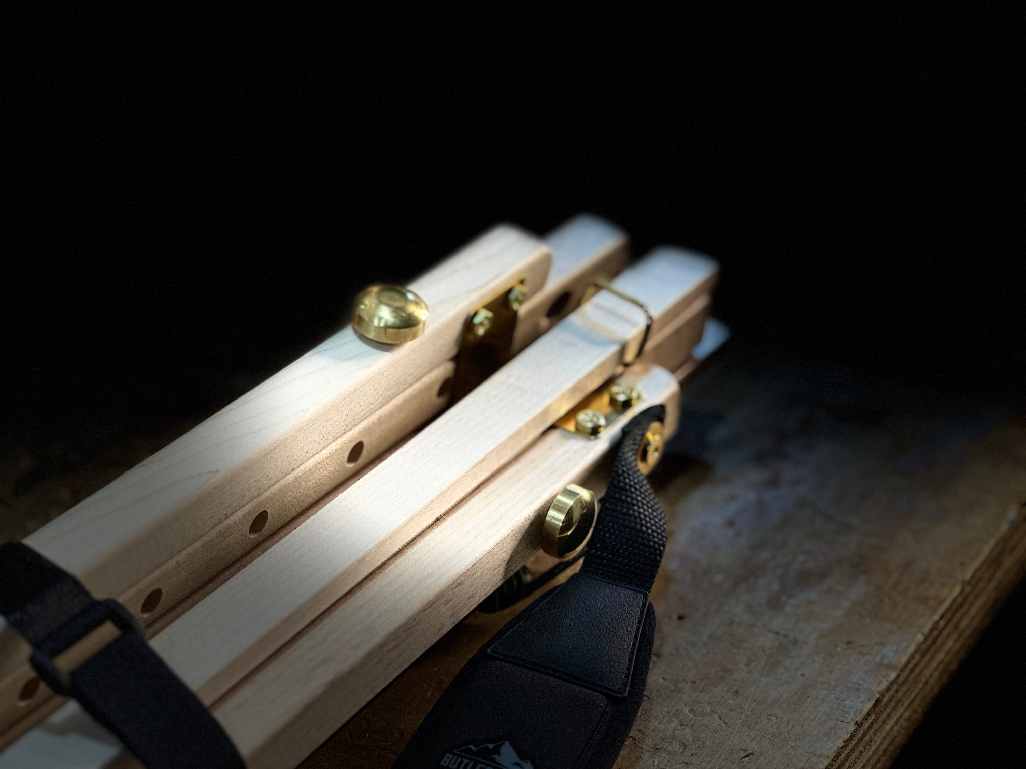 The Nadeau Easel up close so you can see the brass knobs that are used to easily adjust the height of the legs.